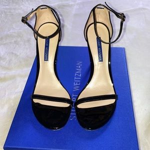 Stuart Weitzman Nudistsong black patent heels
